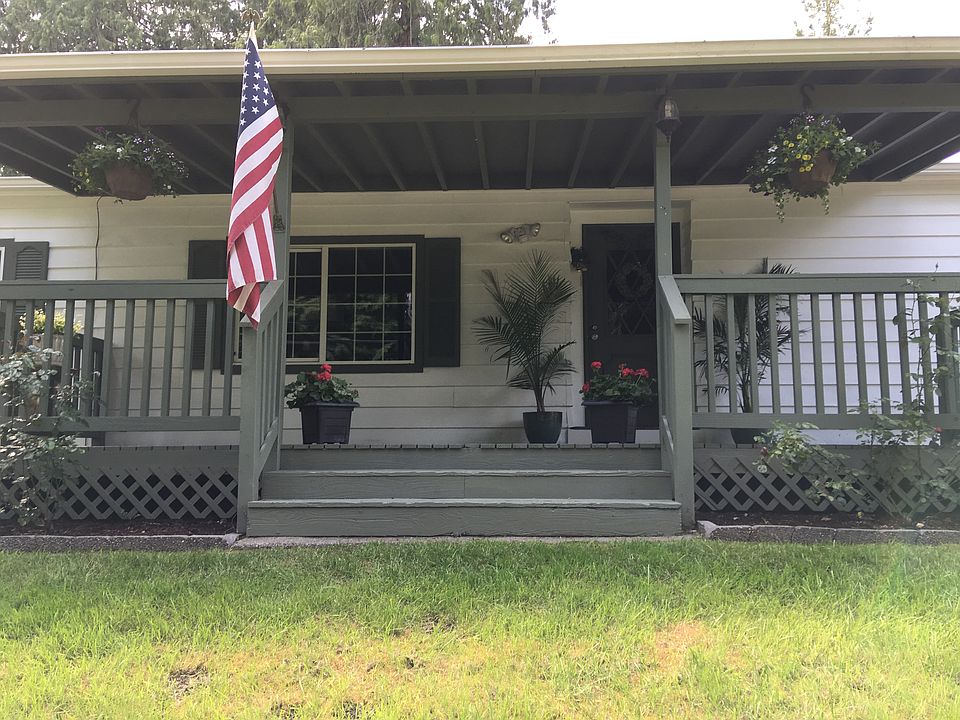 1st image of 6999 NE Whispering Cedar Ln