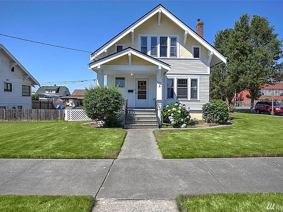A sweet covered front porch draws you in. You'll find three bedrooms on the upper floor and an additional bedroom in the unfinished basement. This location is close to all the best that Downtown Renton has to offer--fantastic dining and retail, parks, trails, and a quick commute!