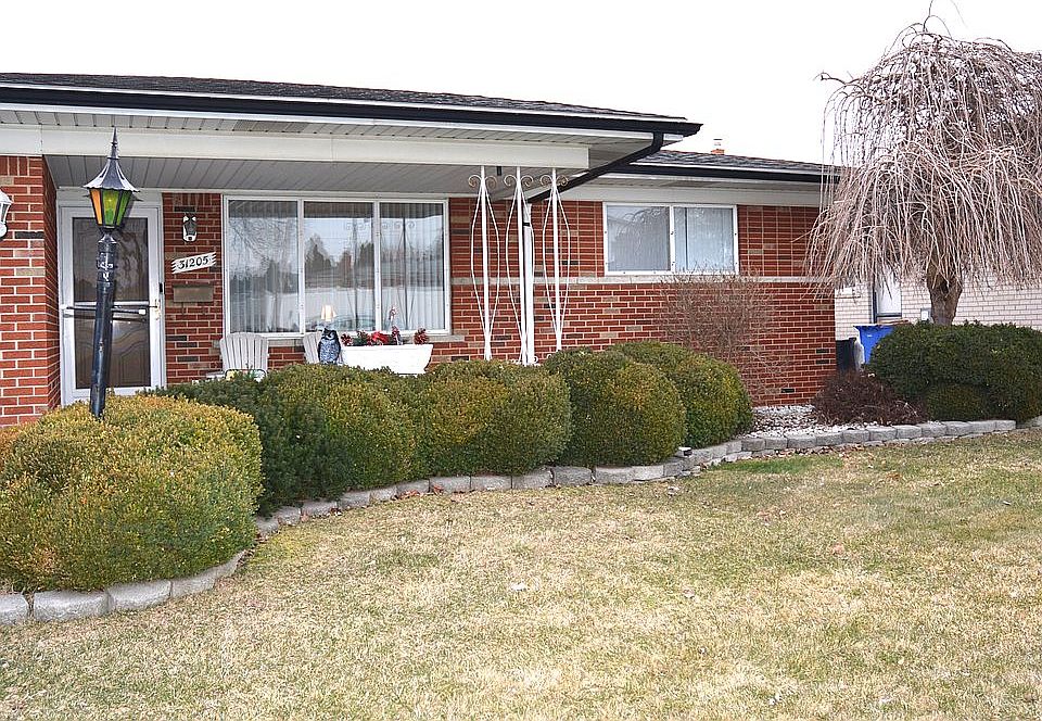 brick home with porch