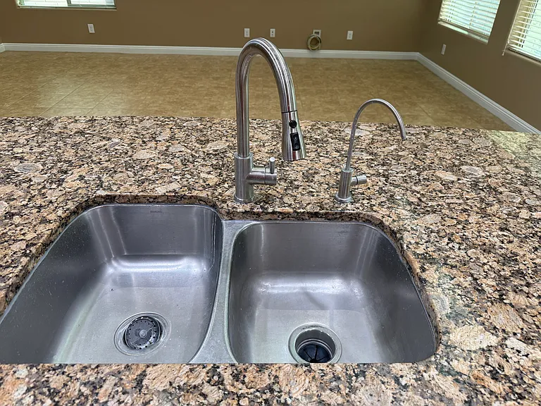 dbl. stainless sinks w/oull down faucet and r/o