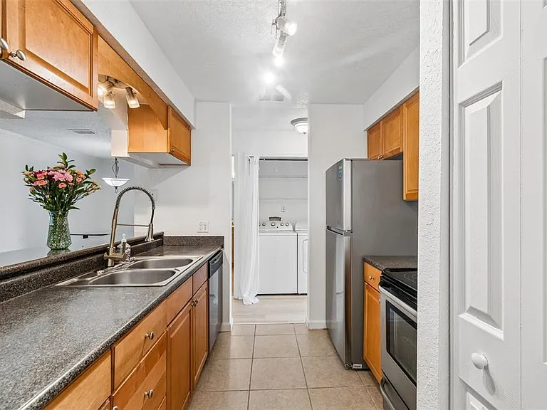 10100 Sailwinds Blvd N #202 — Photo 3