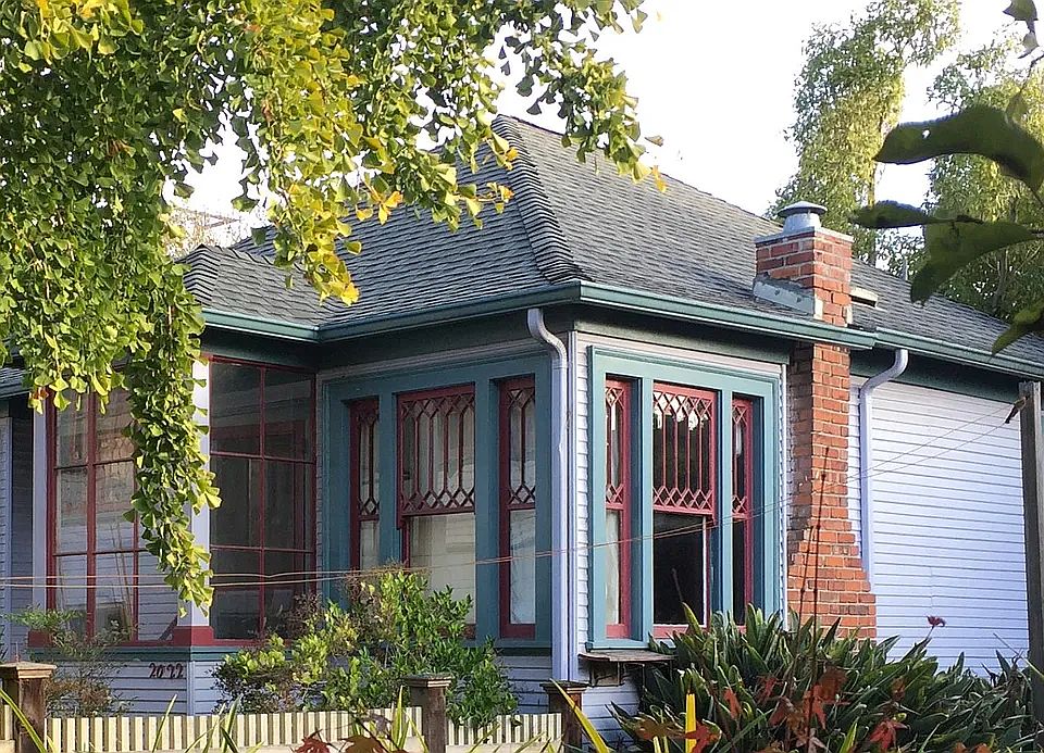 Lush garden setting includes many mature trees, including: century old ginko tree, magnolia and meyer lemon.