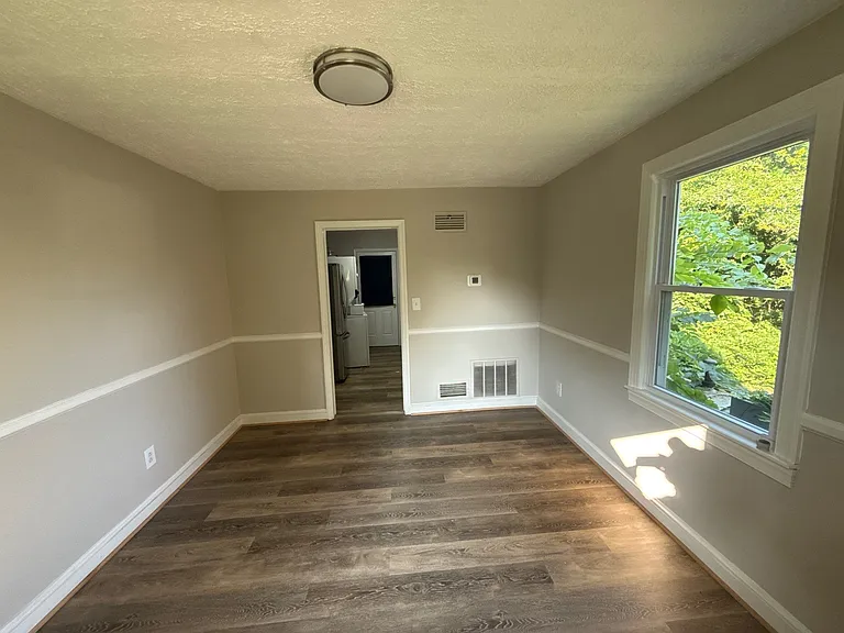 7520 Burgess Ln — Photo 3