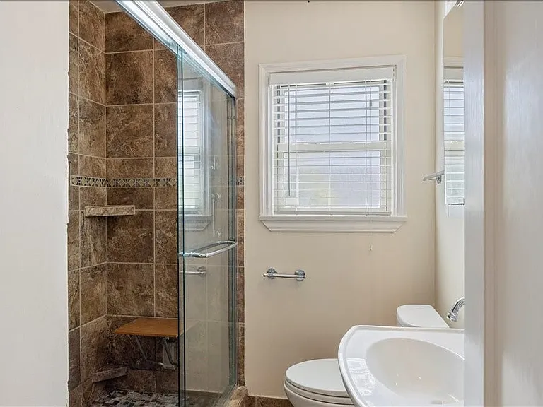 Full hall bath with updated shower.