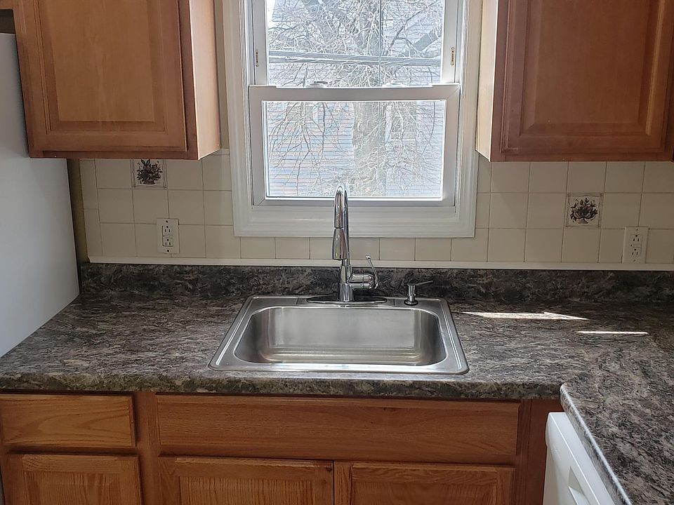 Kitchen Sink and Countertop, Kitchen window facing side of property