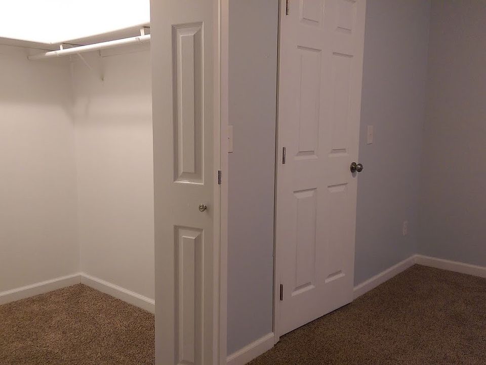 Office sized walk in closet in the master bedroom