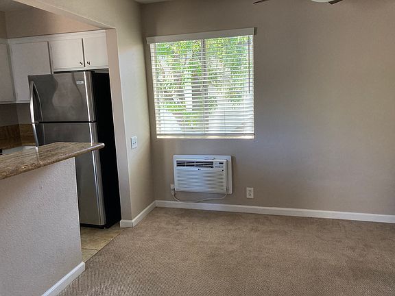 Wall air conditioner adjacent to kitchen
and dining area