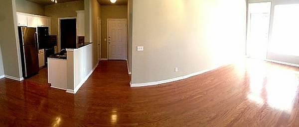 Beautiful entry way, hard wood floors, and granite counter t