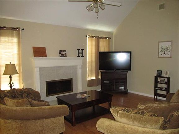 DEN WITH FIRE PLACE