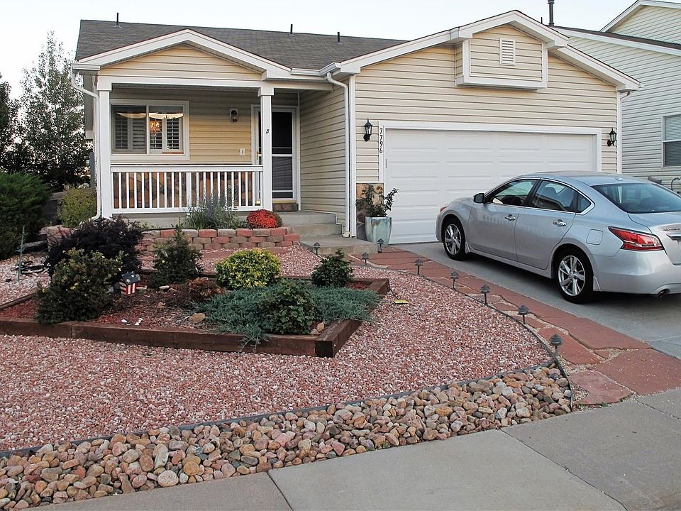 BEAUTIFULLY XERISCAPED WEST FACING CURBSIDE VIEW