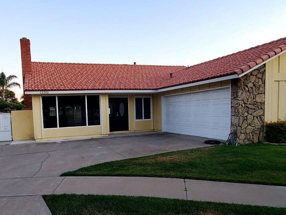 Freshly painted w/ new tile roof.