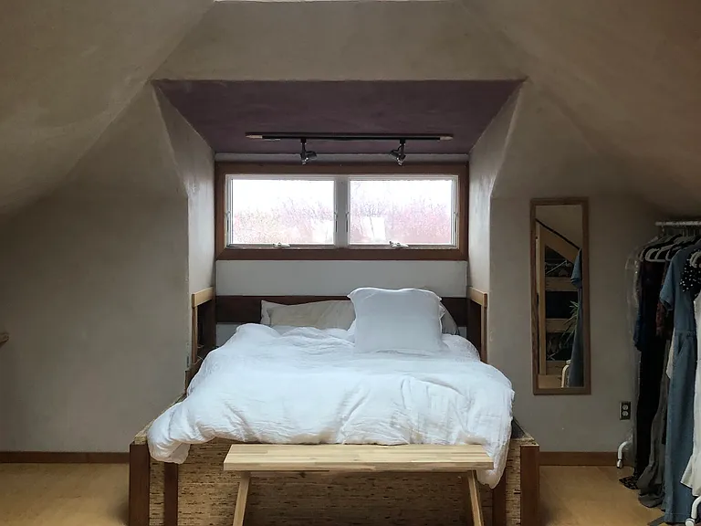 When you get to the top of the stairs there is this bed to your right.