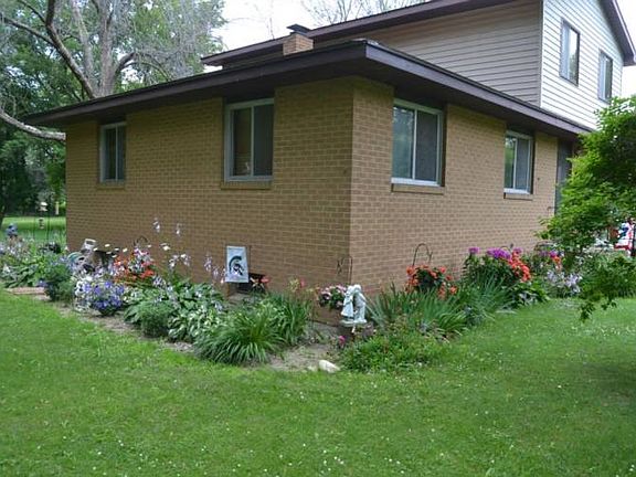 New plantings were recently added to give the landscaping a pop of color.  Many of the planting will return year after year.  They are around the entire home giving the outdoor an inviting feel.
