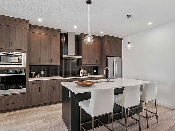 A photo of the kitchen of the Portland laned model by Brookfield Residential