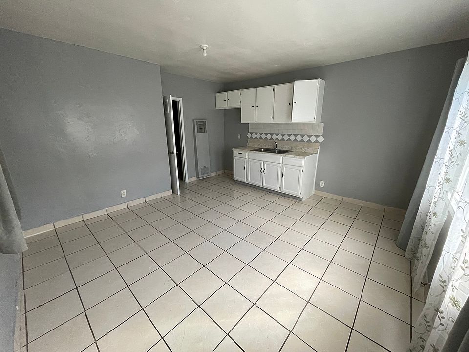 This is a studio apartment. Living area / kitchen/ bed is all in this space.