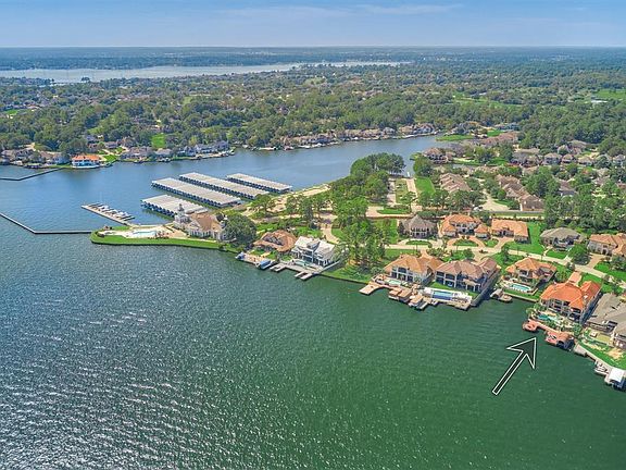 Tucked away in the privately gated section of Bentwater on Lake Conroe, this waterfront property is truly a dream come true. Stratigically facing east/slightly south... for tranquil afternoon shade in the backyard and pool area.