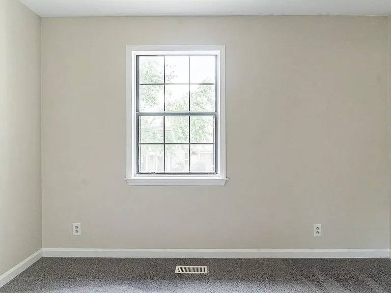 Please note that the carpet has been removed and replaced with hardwood floors.