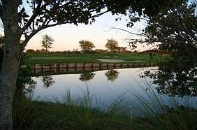 Overlooks LaPlaya Golf Club and Lake