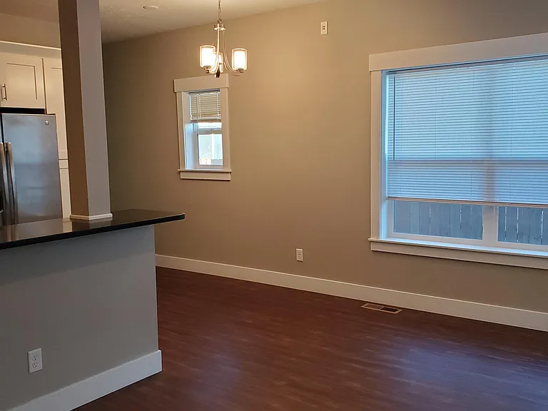 From the Front door looking into the LR/Dining/Kitchen area.
