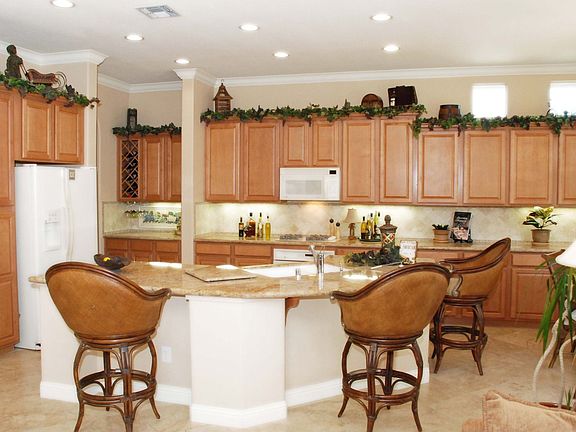 Gourmet Kitchen; Granite Counters; Island with Sink; Custom Maple Cabinets