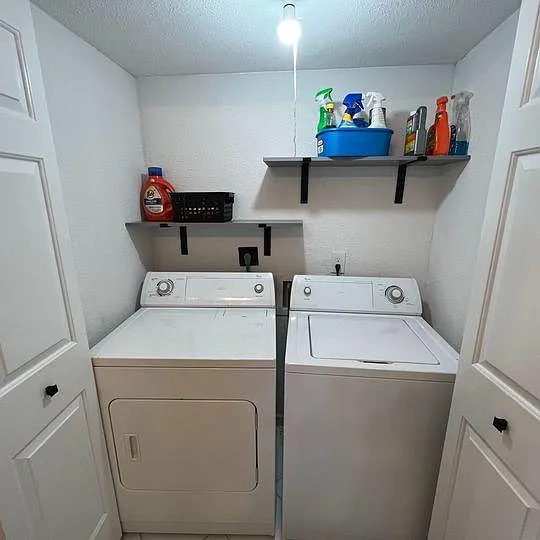 Washer and dryer located inside the unit