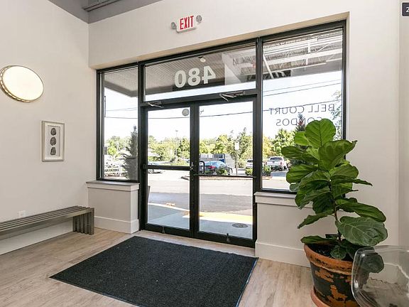 View of resident parking lot from entrance of building