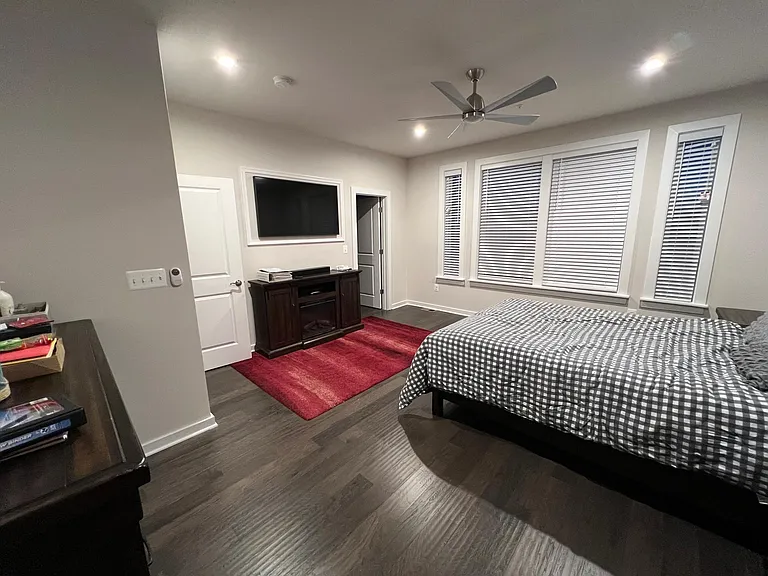 Owner's bedroom with built in wiring for tv