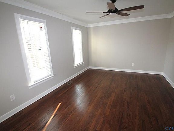 Formal, front facing living room w/ C-fan!