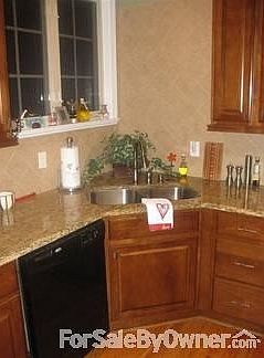 Undermount stainless sink.
						:
						undermount stainless, double bowl kitchen sink and tile backsplash.