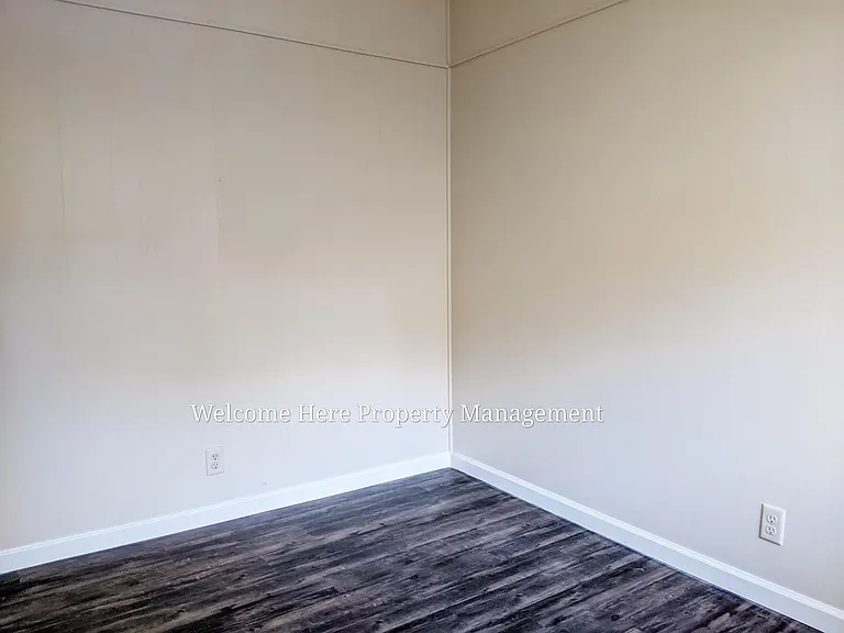 Back bedroom, 11' by 8'