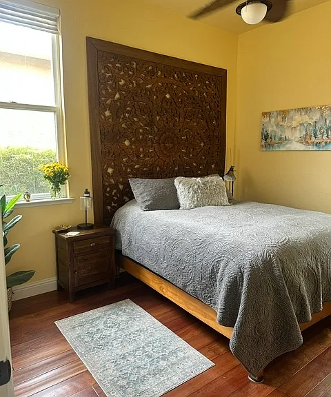 Bedroom #2 with walk-in closet, dresser and mirror