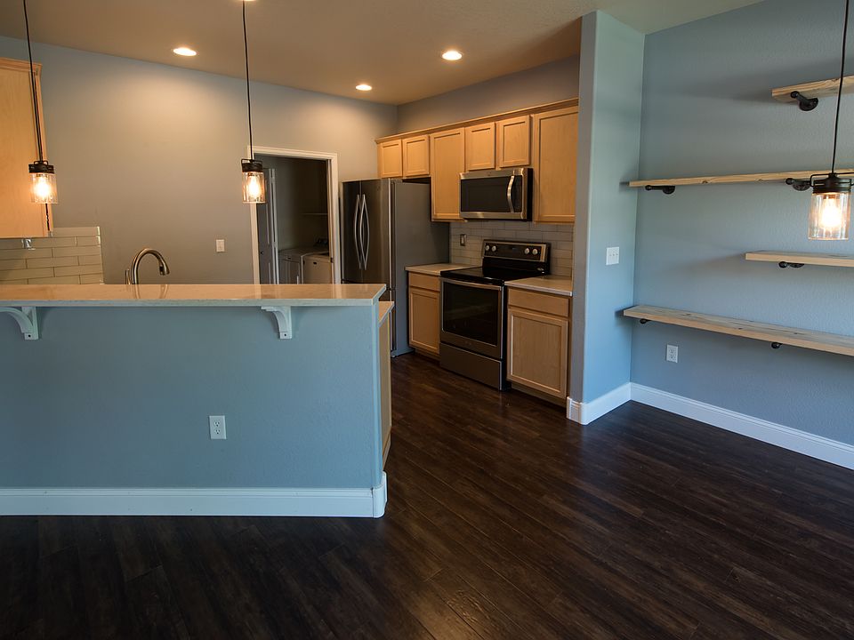 Kitchen and Dining room area at front door entry way.