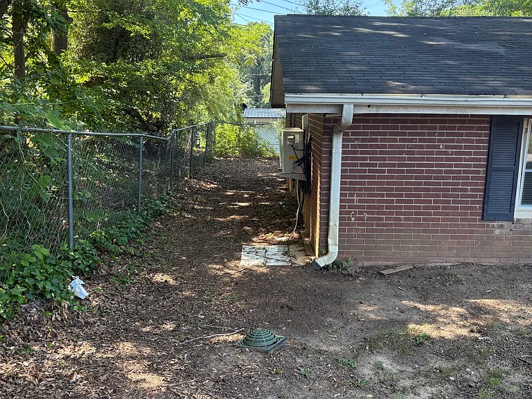 Side of the home leading to backyard