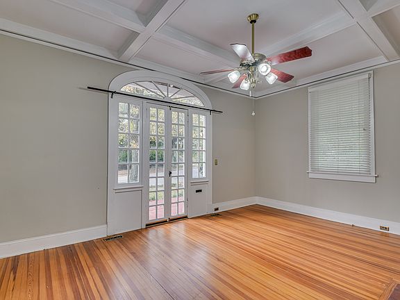 Living room with cased ceiling