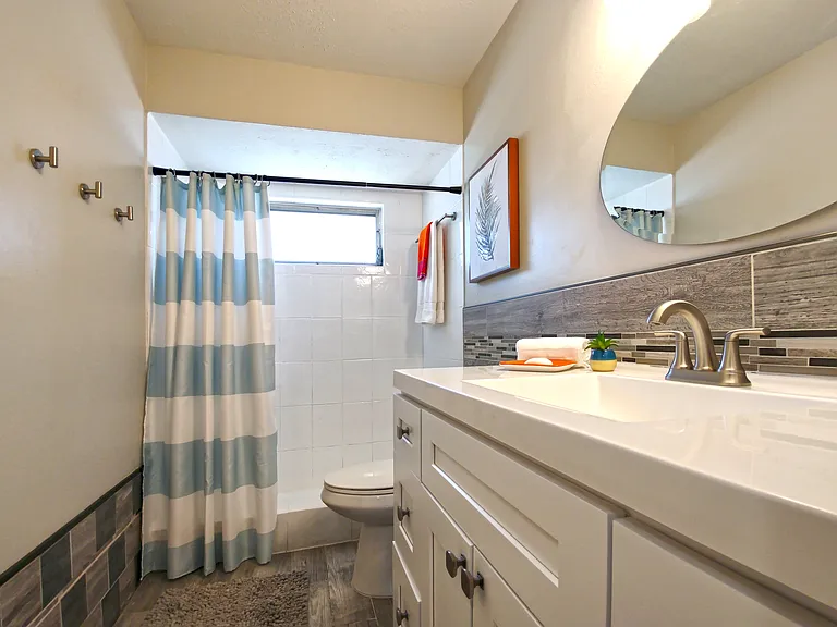 Second Bathroom with Large Shower & Plenty of Hooks for Your Beach Gear