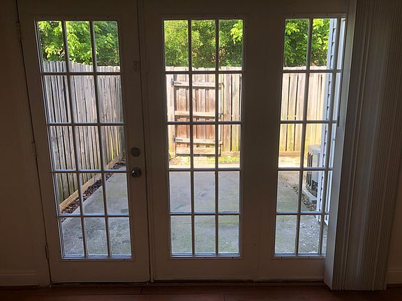 From living room looking out at enclosed patio.
