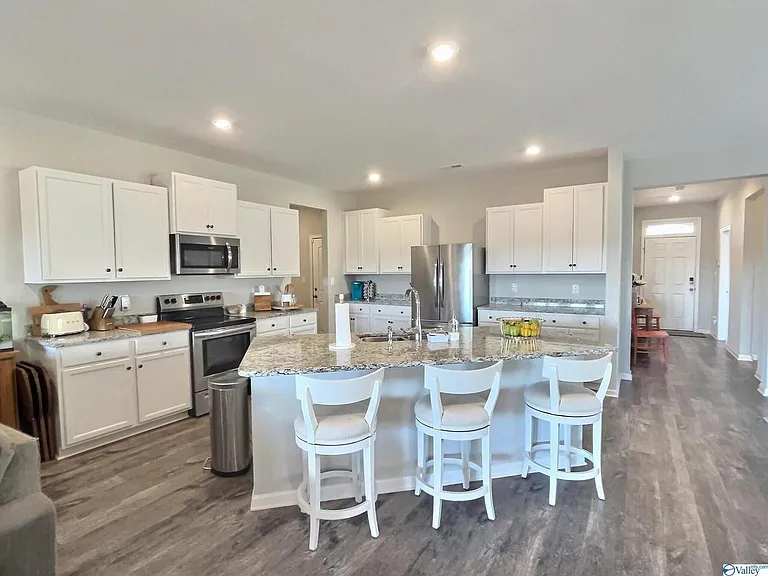 Spacious kitchen with granite counters