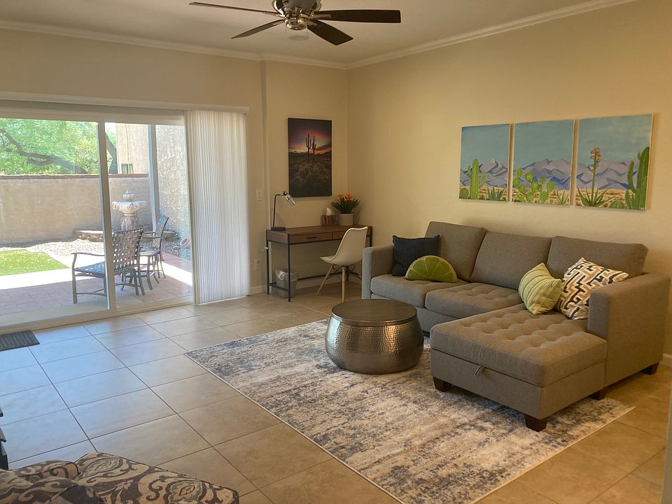 Living area with huge sliding glass door to private backyard