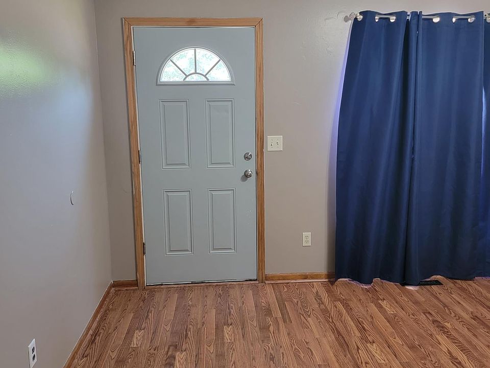 living room from hall with front door