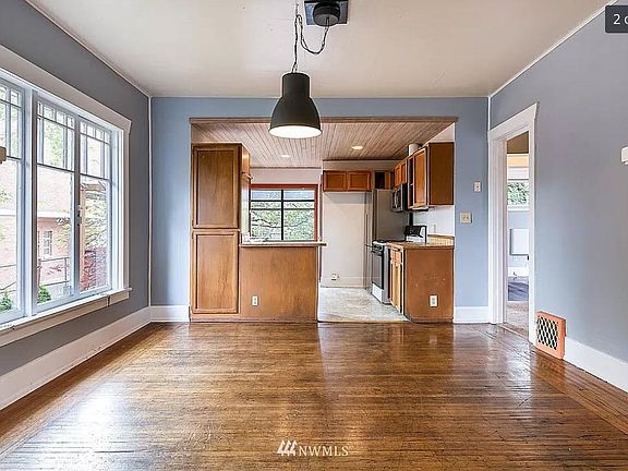 Kitchen will be updated with new cabinets, quartz countertops, and brand-new stainless steel appliances.