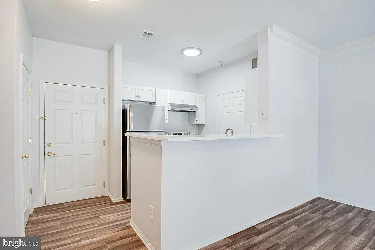 1571 Spring Gate Dr — Photo 2