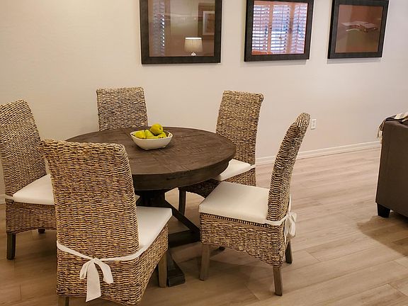 Dining table with leaf to easily accommodate six.