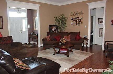 Family Room
						:
						Opens to eating area, foyer and hallway to two bedrooms and full bathroom