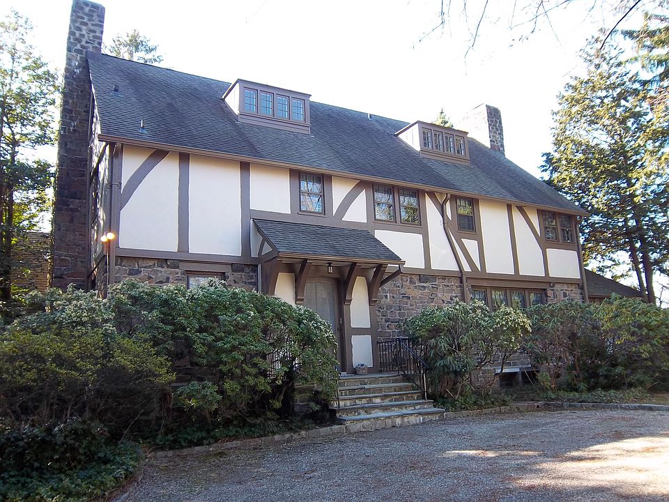Grand Scale Stucco and Stone English Colonial Home