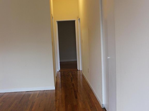 Hallway to bathroom and bedrooms