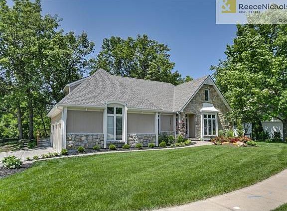 Brick walkway leads you to the home
