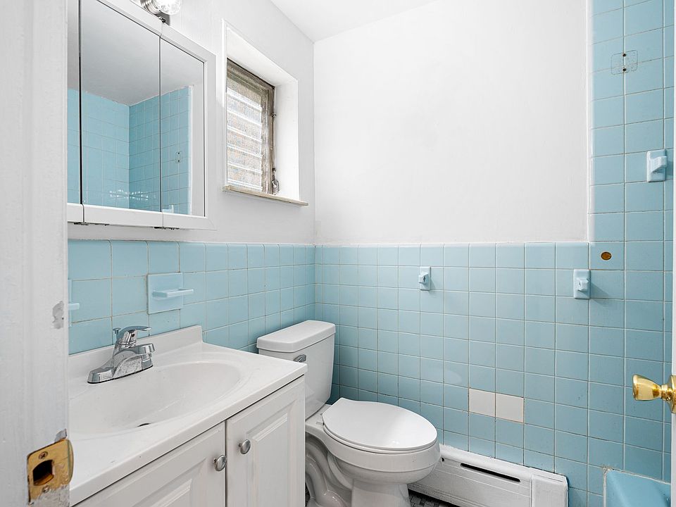 Bright bathroom with shower & tub.