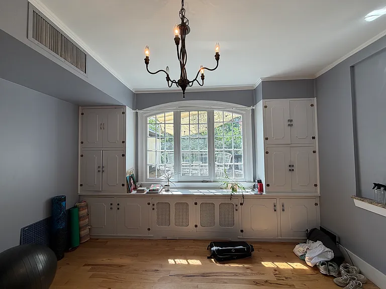Formal dining room/Flex room. Window looks out on private outdoor deck.