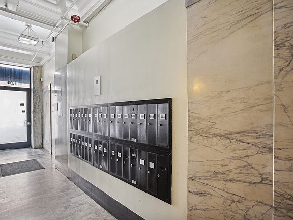 Apartment foyer with stylish design and mailboxes
