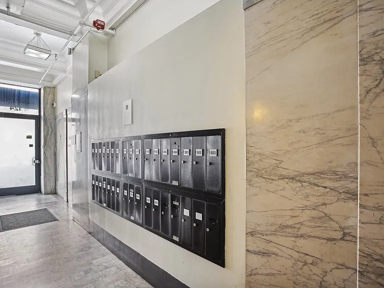 Apartment foyer with stylish design and mailboxes